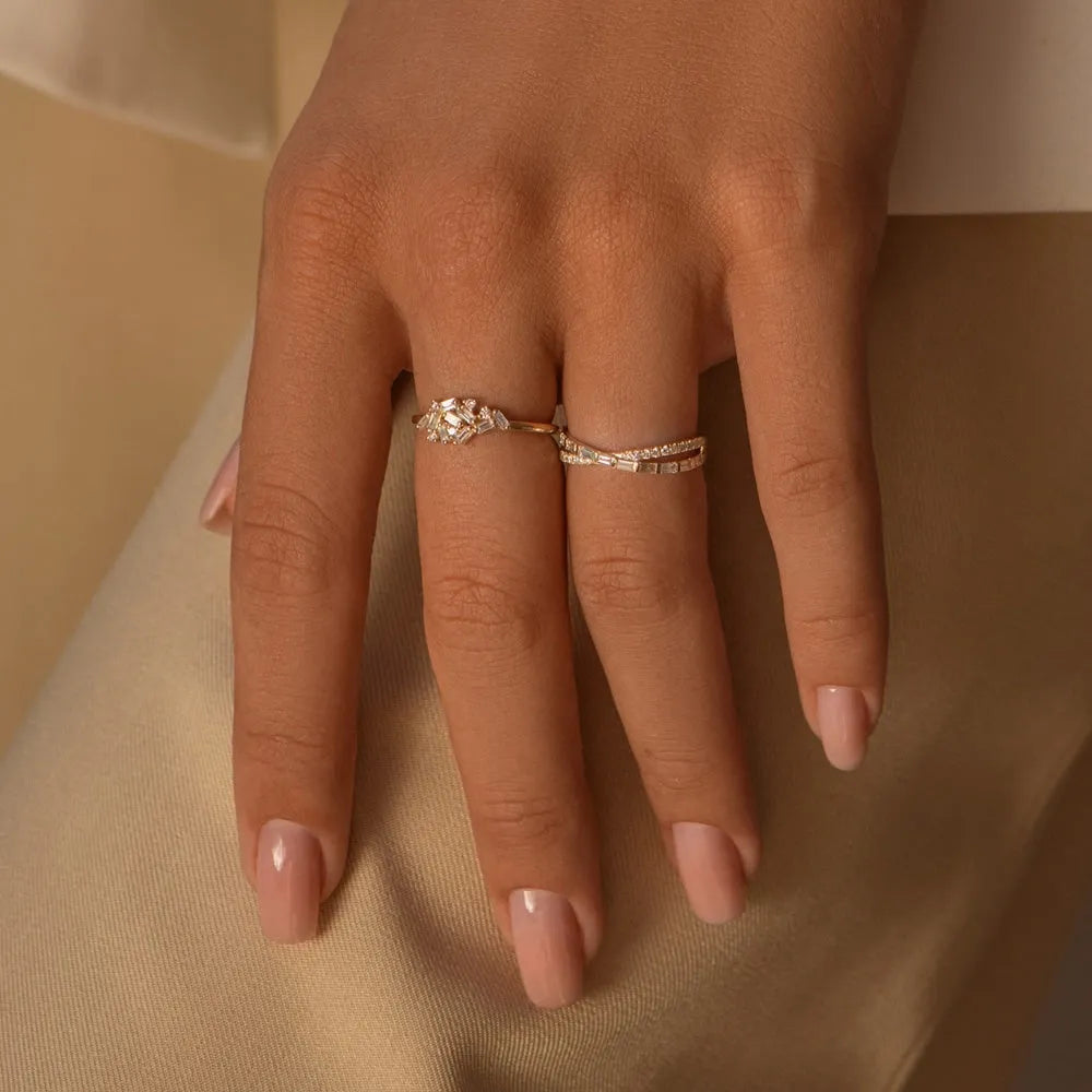14k Gold 0.49 Carat Round and Baguette Diamond Crossover Ring