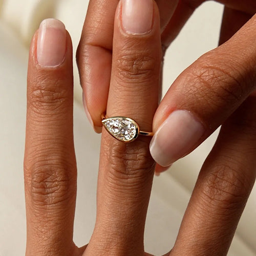 14K Gold 1.50 Carat Lab Grown Diamond Pear Shaped East West Bezel Setting Engagement Ring