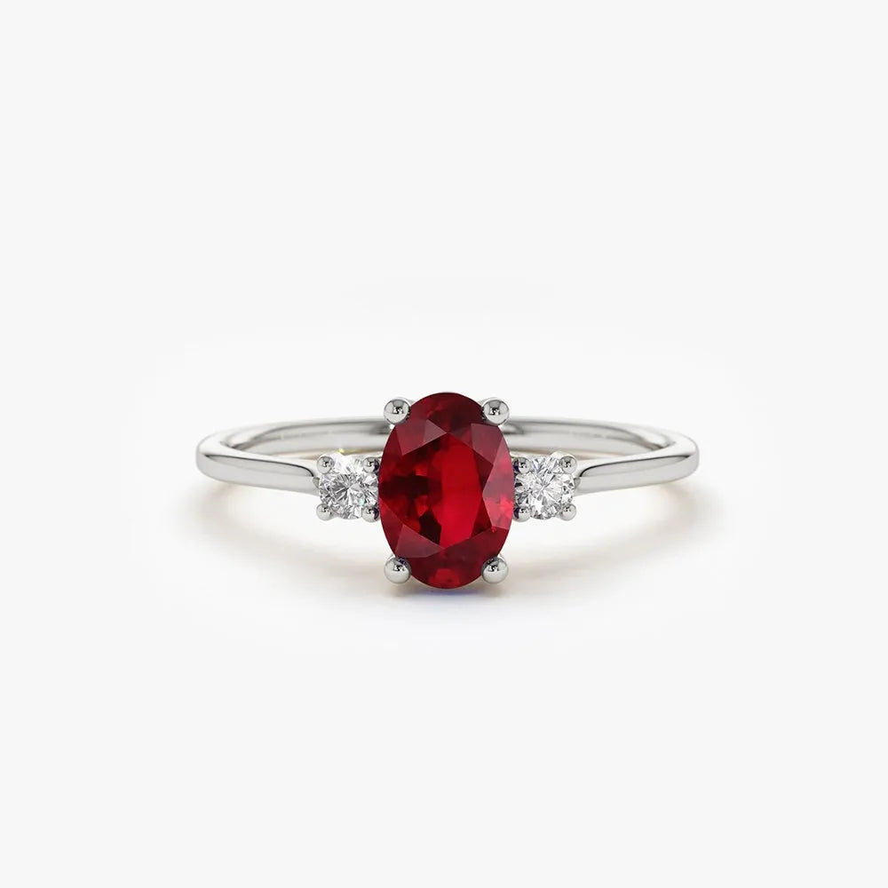 14k Gold Ruby and Diamond Oval and Round Cut Three Stone Ring 0.77 ctw