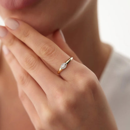 14K Gold Marquise Sapphire and 0.14 Carat Diamond Halo Ring