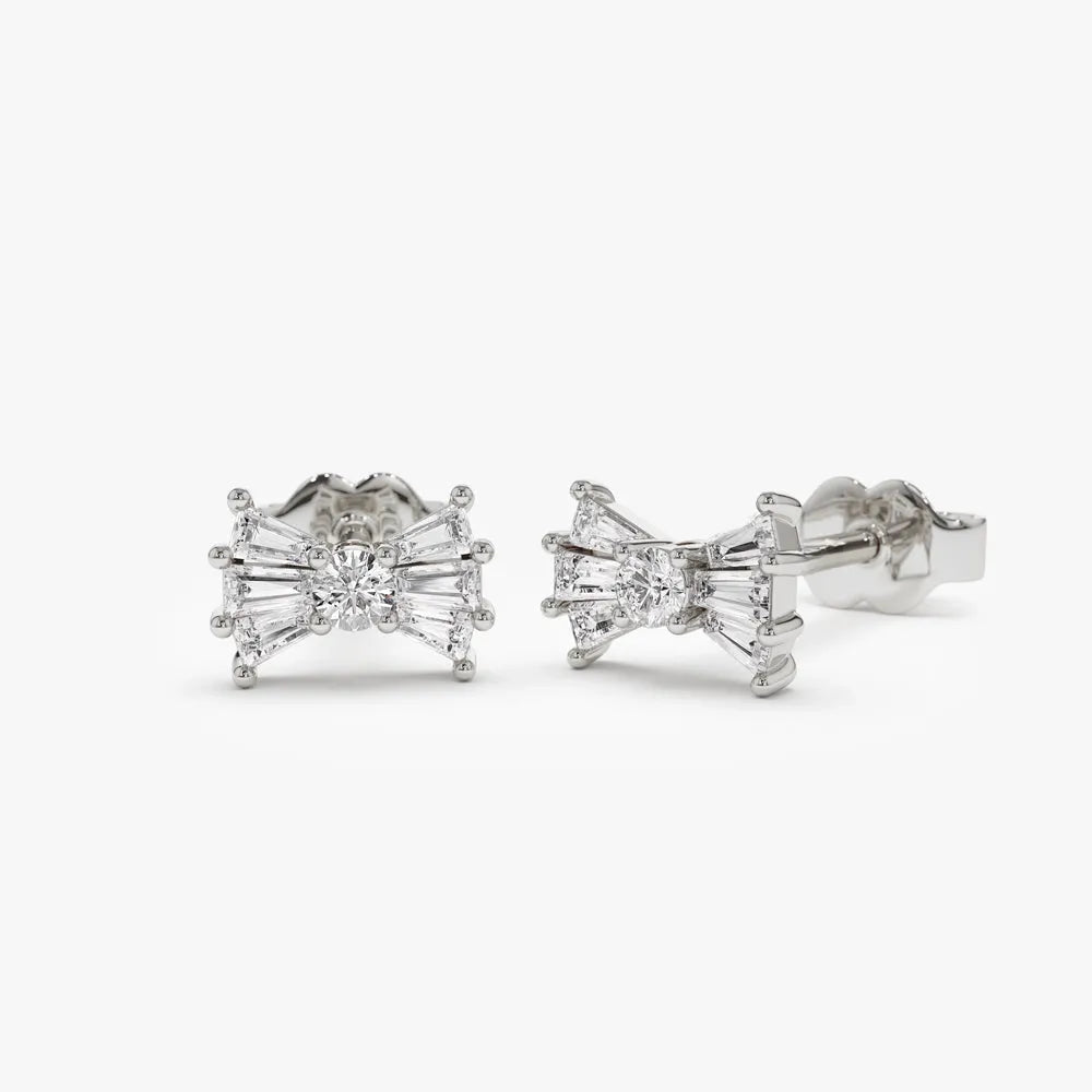 14k Gold Diamond Baguette and Round Cut Bow Stud Earrings 0.25 ctw