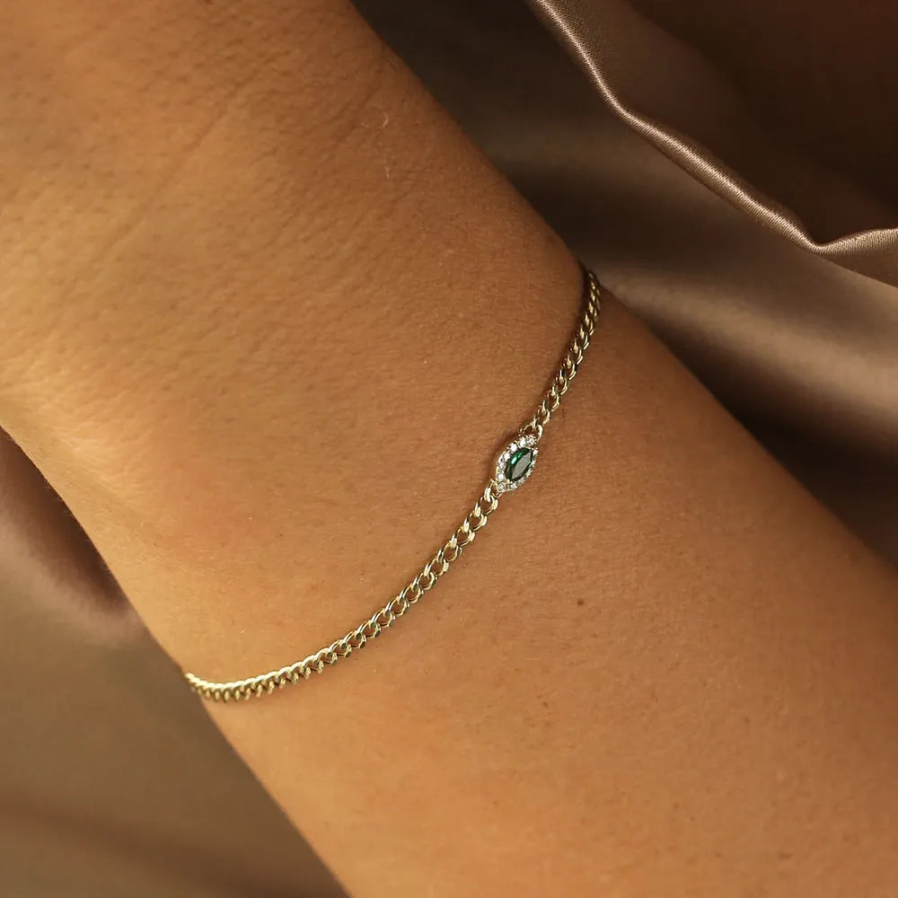 14k Gold 0.10ct Marquise Emerald and Round Diamond Curb Link Bracelet