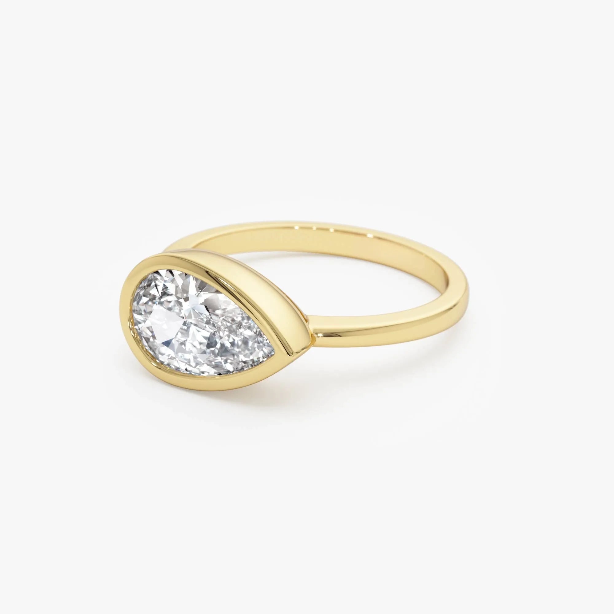 14K Gold 1.50 Carat Lab Grown Diamond Pear Shaped East West Bezel Setting Engagement Ring