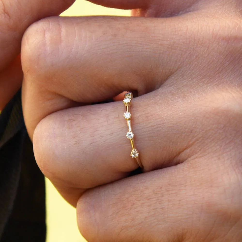 14k Gold Round Diamond Spaced Stacking Ring 0.10 CTW Prong Set
