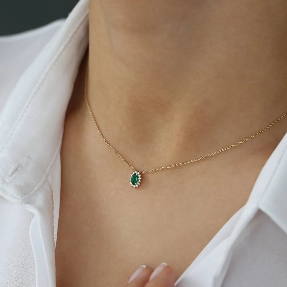 14k Solid Gold Oval Emerald 0.25 CTW and Round Diamond 0.12 CTW Halo Necklace