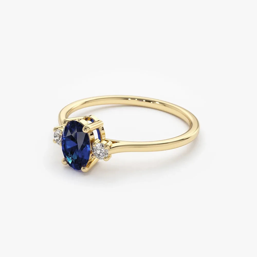 14k Gold Sapphire and Diamond Oval Cut Three Stone Ring 0.62 ctw