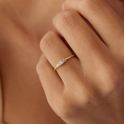 14k Gold Round Diamond Three Stone Twisted Ring 0.16 ctw