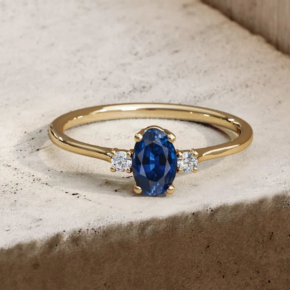 14k Gold Sapphire and Diamond Oval Cut Three Stone Ring 0.62 ctw