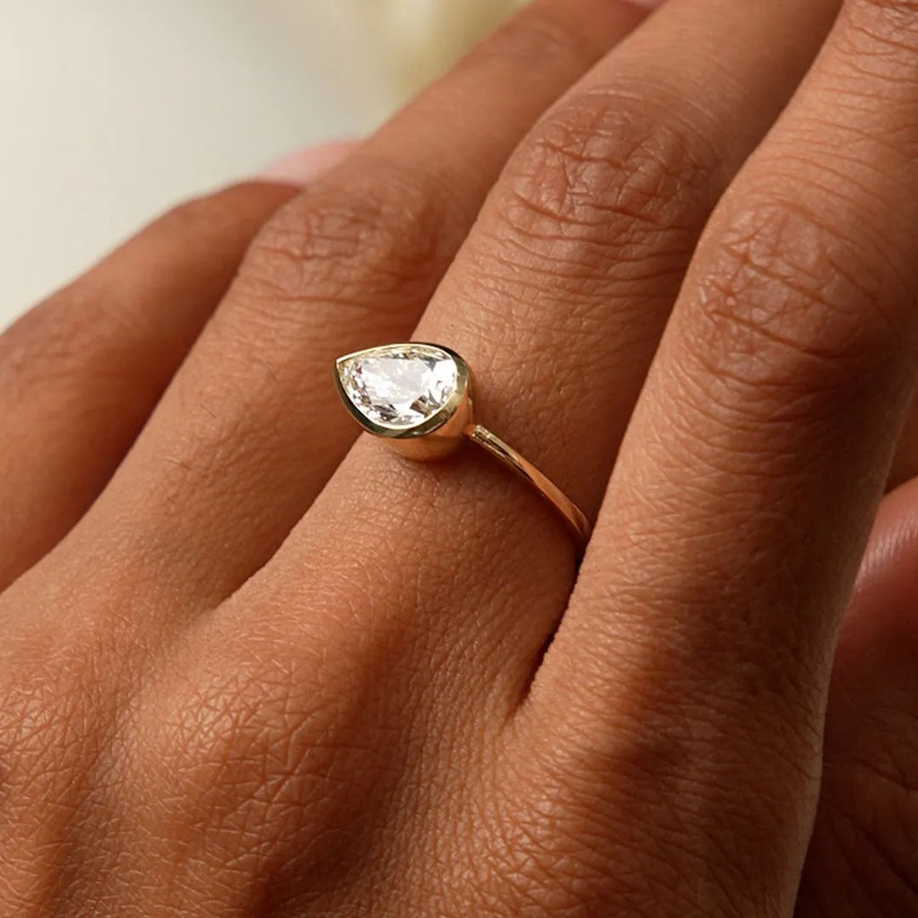 14K Gold 1.50 Carat Lab Grown Diamond Pear Shaped East West Bezel Setting Engagement Ring