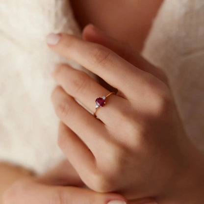 14k Gold Ruby and Diamond Oval and Round Cut Three Stone Ring 0.77 ctw