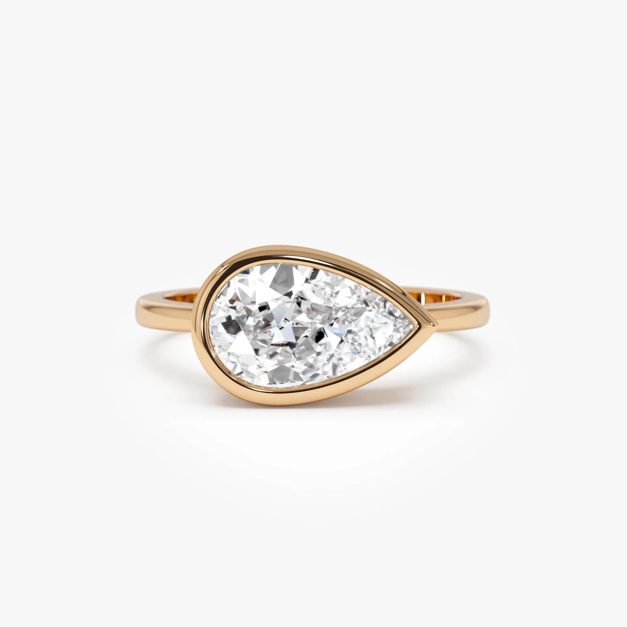14K Gold 1.50 Carat Lab Grown Diamond Pear Shaped East West Bezel Setting Engagement Ring