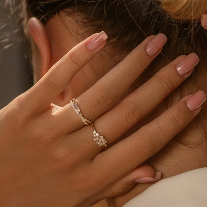 14k Gold 0.49 Carat Round and Baguette Diamond Crossover Ring