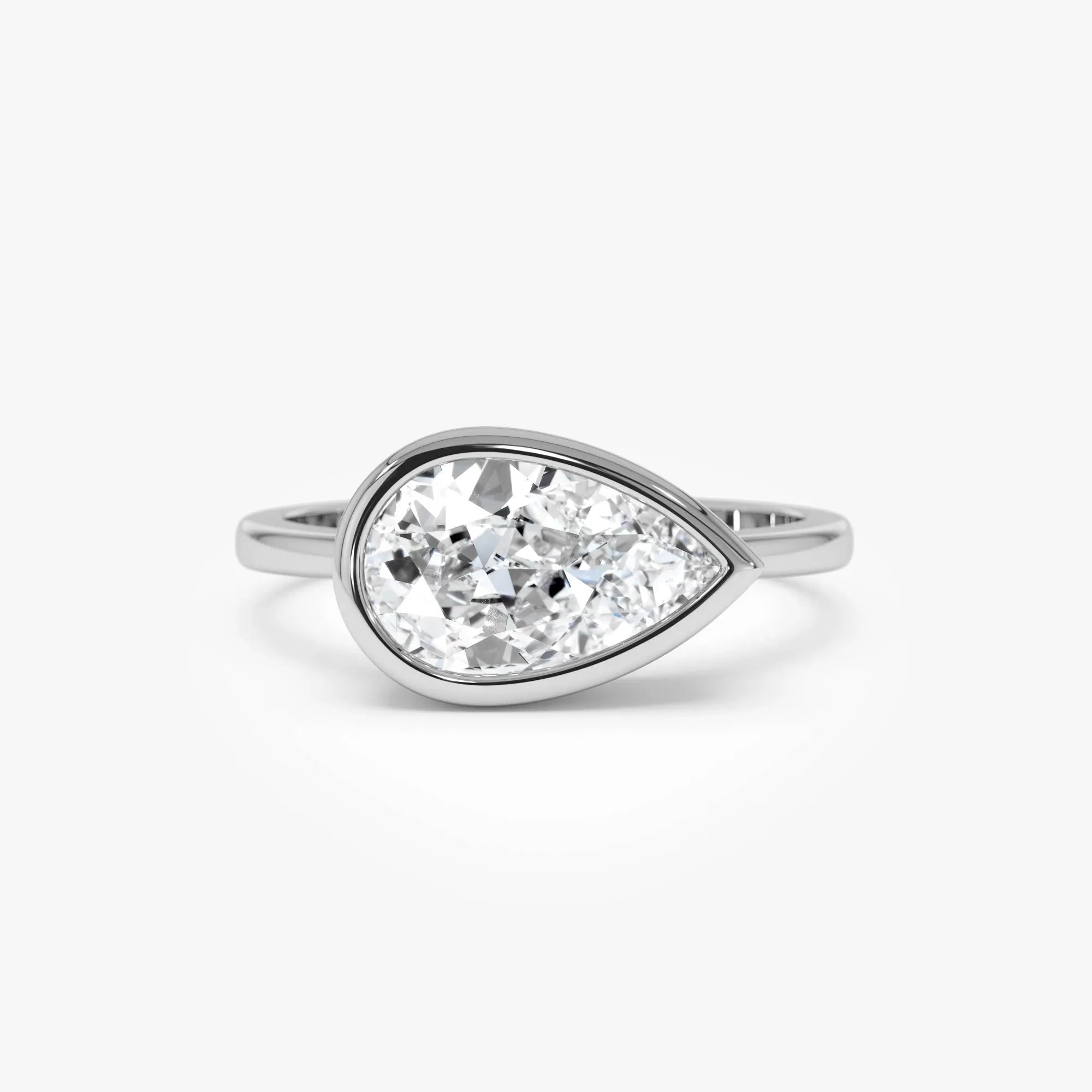 14K Gold 1.50 Carat Lab Grown Diamond Pear Shaped East West Bezel Setting Engagement Ring