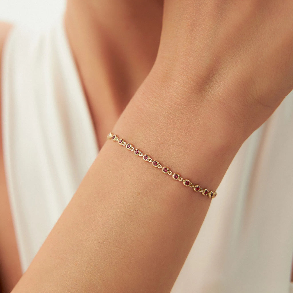 14k Gold Round Ruby Bezel Set Tennis Bracelet