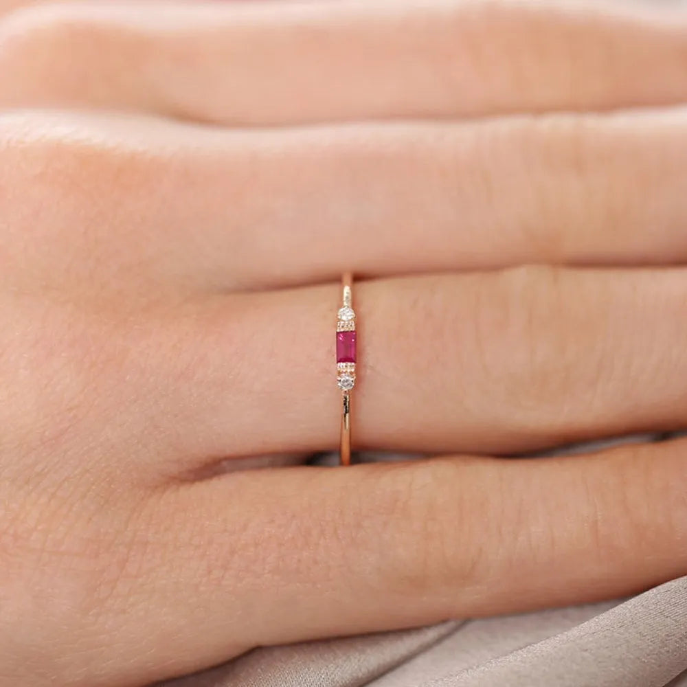 14k Gold Ruby and Diamond Baguette and Round Cut Ring Channel and Prong Setting 0.14 ctw