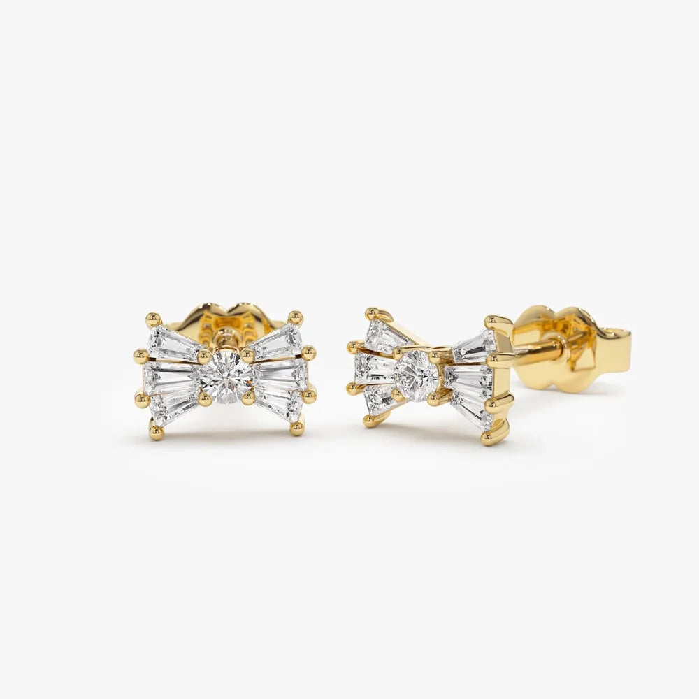 14k Gold Diamond Baguette and Round Cut Bow Stud Earrings 0.25 ctw