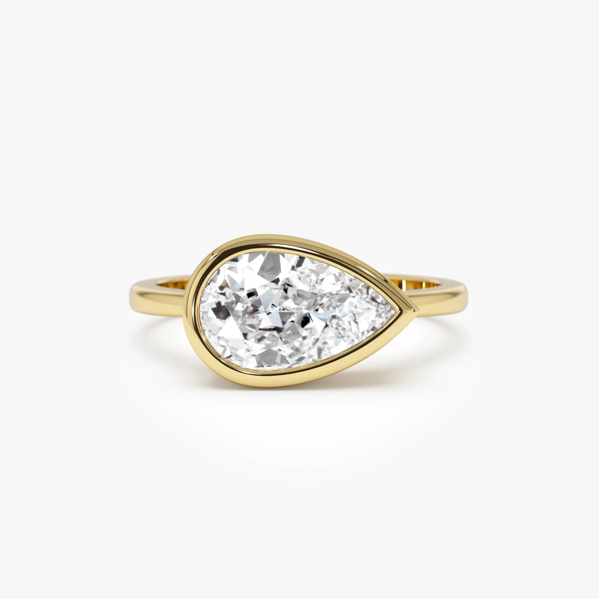 14K Gold 1.50 Carat Lab Grown Diamond Pear Shaped East West Bezel Setting Engagement Ring