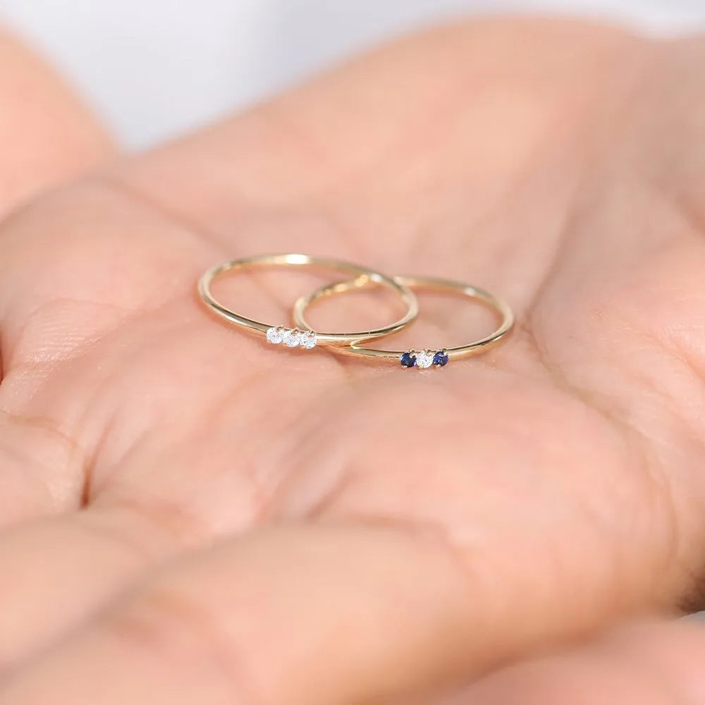 14k Gold Sapphire and Diamond Round Cut Minimal Three Stone Ring 0.06 ctw