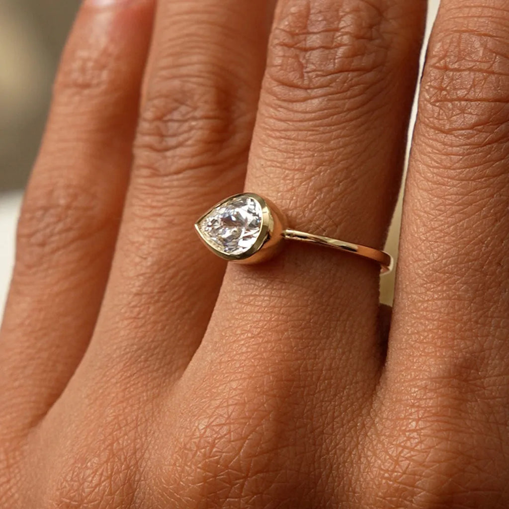 14K Gold 1.50 Carat Lab Grown Diamond Pear Shaped East West Bezel Setting Engagement Ring