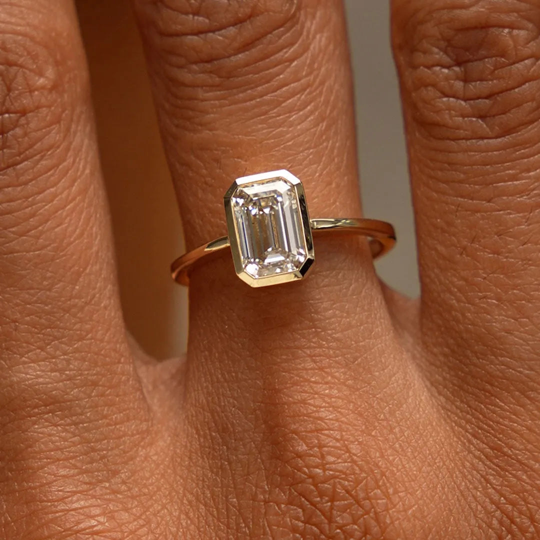 14k Gold 1.50 Carat Emerald Cut Lab Grown Diamond Bezel Setting Engagement Ring IGI Certified